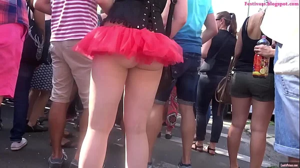 Festival Upskirt, frilly micro skirt with string panties. Great ass revealed!