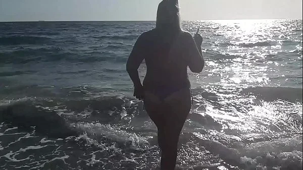 Hot milf masturbation on beach. So horny outside