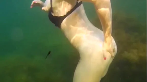 Crazy diver took me on camera while I am swimming in the sea and flashing my hairy pussy