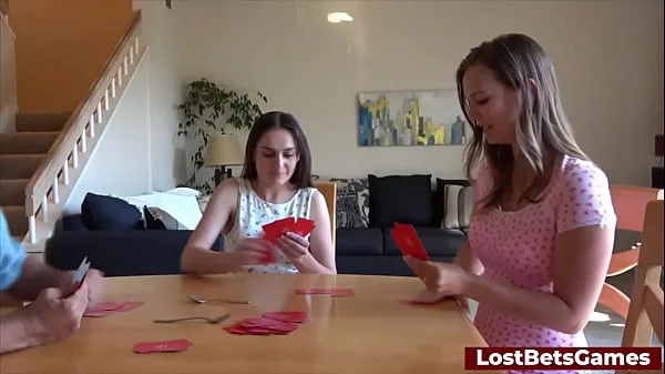 A relaxed strip card spoons game with two eager hotties