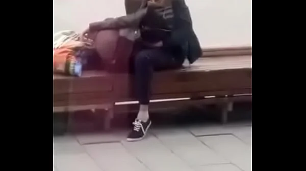 Stupid blonde gives blowjob in public