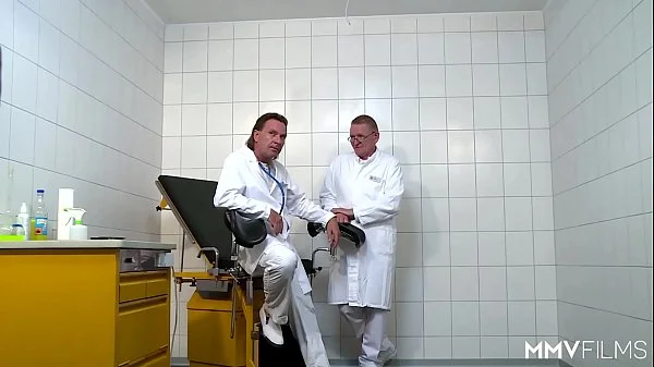 Doctors treating a patient's butthole