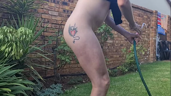 Hosing my ass and cunt out in the garden