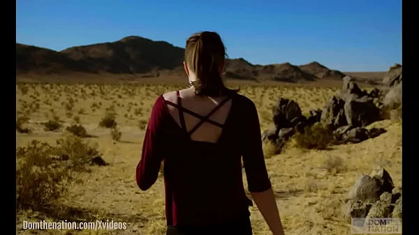 Petite, hardcore submissive masochist Brooke Johnson drinks piss, gets a hard caning, and get a severe facesitting rimjob session on the desert rocks of Joshua Tree in this Domthenation documentary