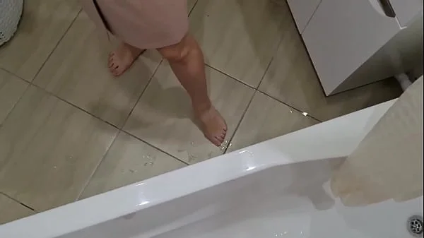 Stepmother came home from work and saw her son's big cock in the bathroom