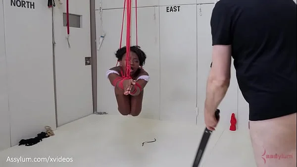 Beautiful black submissive gets gagged, tied up, ass punished, and turned into an anal compass to help her dominant conquer space - Noemie Bilas