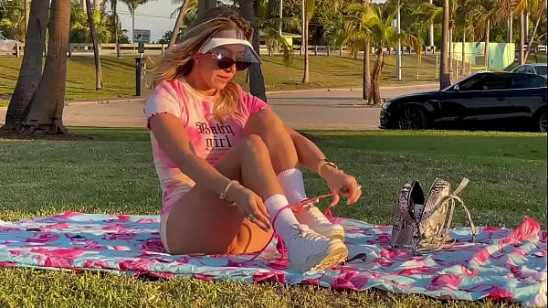 Incredible teen blonde playing without panties in public park