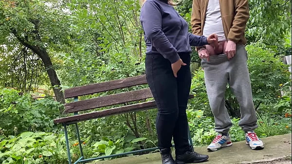 Cum on big ass MILF in jeans in the park